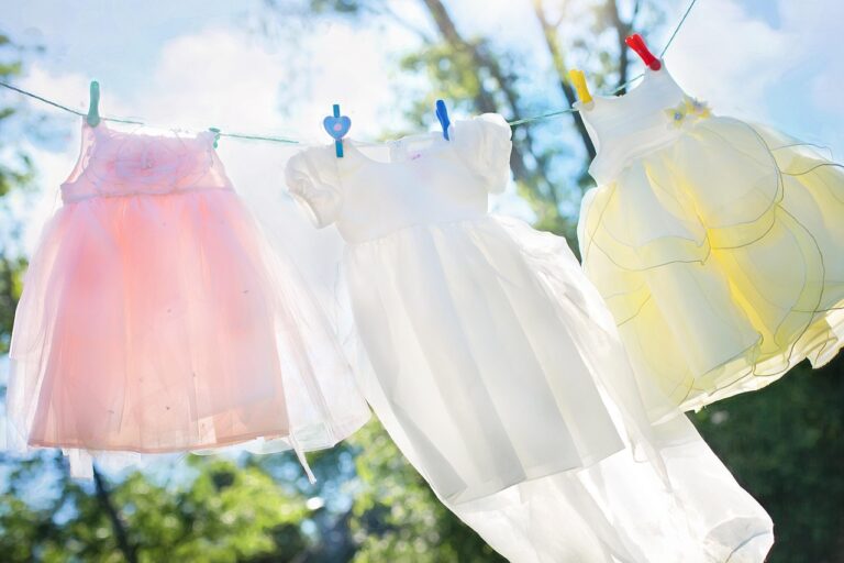 How to Remove Stains from Kids' Clothes: A Comprehensive Guide clothesline, little girl dresses, laundry, hang, clothespins, clean, airy, washed clothes, clothing, dresses, children's clothes, clothes